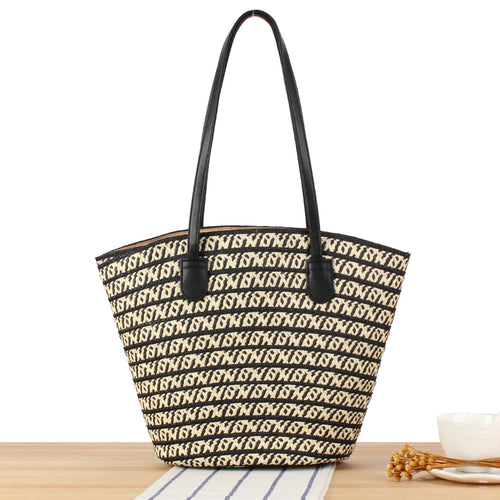 Designer handbag with contrasting pattern and elegant leather handles Skanto