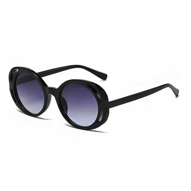 Dame Ovalformet Designer-solbrille med klassisk detalj Skanto