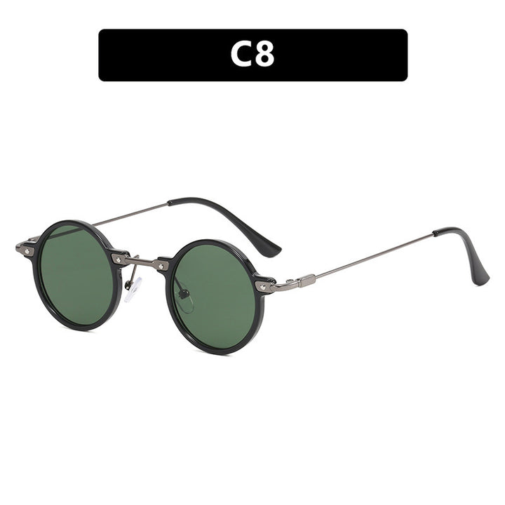 Dame rund solbrille med moderne metallramme og store blå linser Skanto
