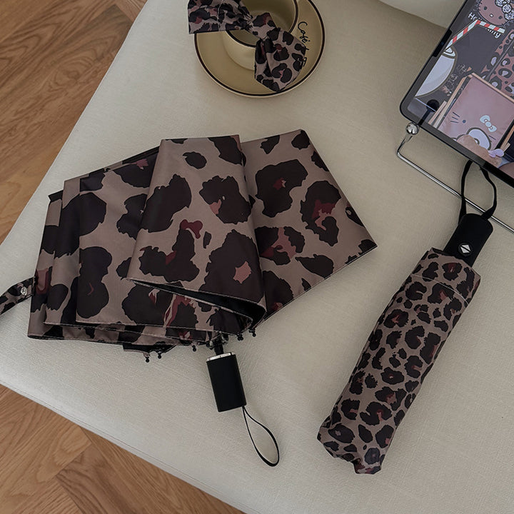Dame sammenleggbar paraply i moderne leopardmønster Skanto