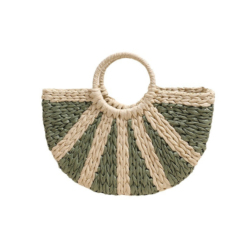 Handbag made of hand-woven raffia with structured base Skanto
