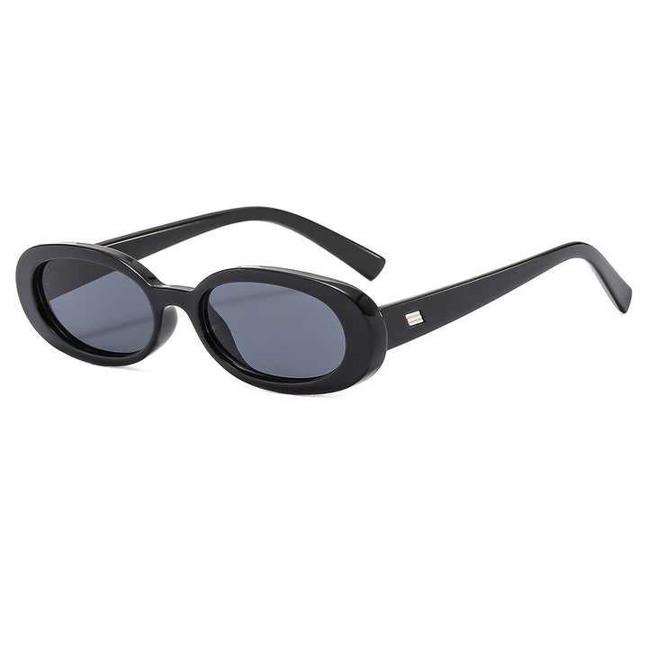 Dame stilfulle solbriller med oval ramme og trendy linser Skanto