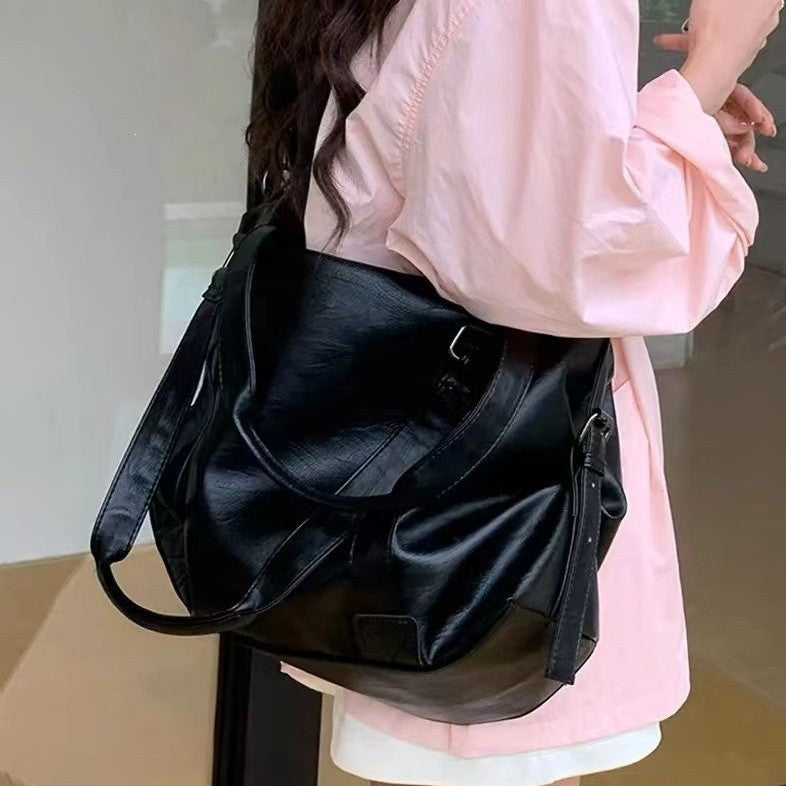 Mangfoldig crossbody-veske Skanto