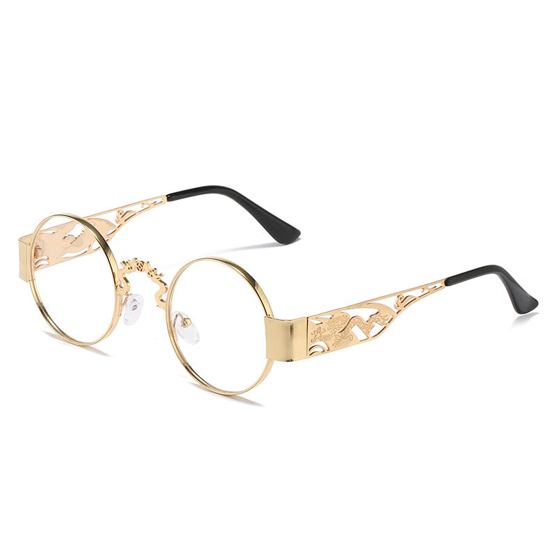 Dame kunstnerisk rundt solbrille med elegant filigranramme Skanto