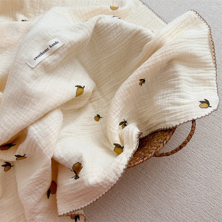 Unisex Musselinteppe med delikat blomsterdesign og elegante volanger Skanto