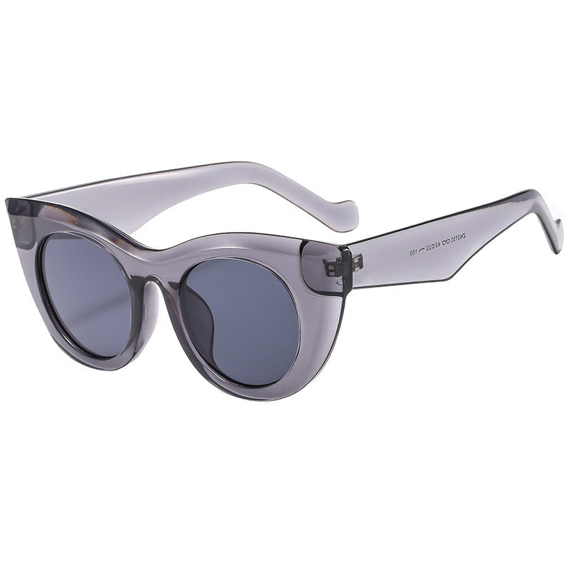 Dame Cat-Eye solbriller med transparent ramme og polariserte linser Skanto