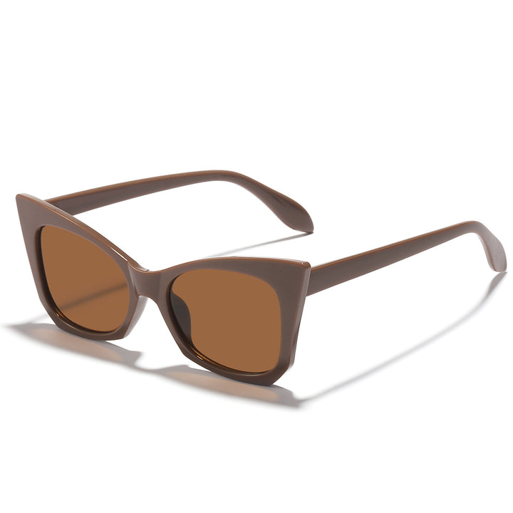 Dame solbrille i trendy katteøye-design med iøynefallende leopardmønster Skanto