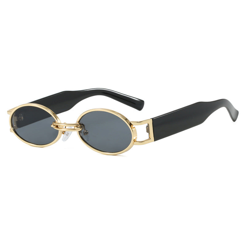 Women's oval sunglasses with golden accents and stylish frame Skanto