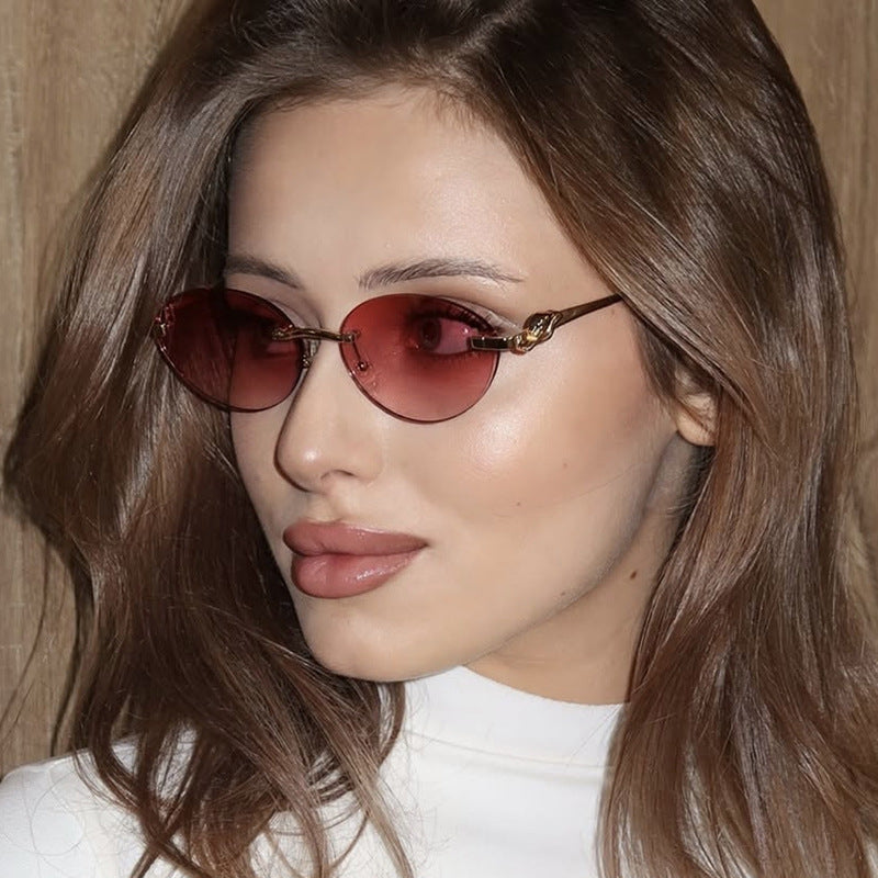 Women's round sunglasses with elegant, semi-transparent frame and stylish details Skanto