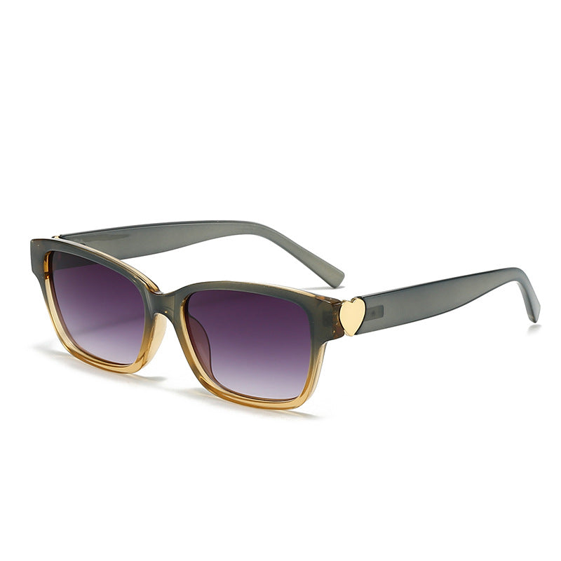 Dame moterik kvadratisk solbrille med hjerte-senter Skanto