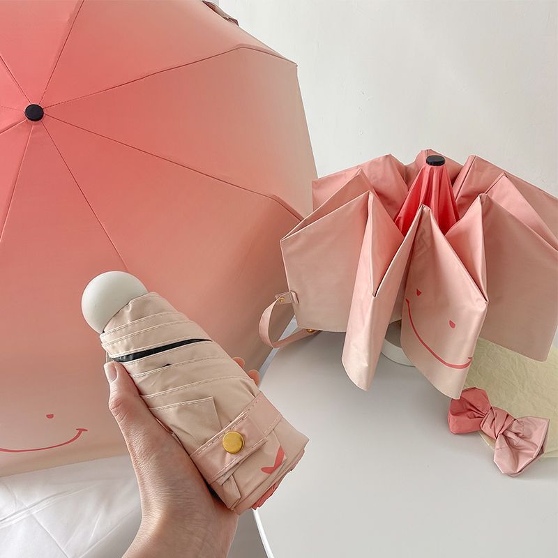 Dame foldbare paraply med leken design og praktisk treskaft Skanto