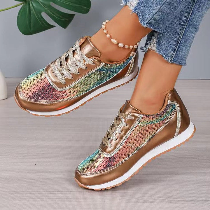 Dames fashionable sneakers med skimrende overmateriale og skli-resistent såle Skanto