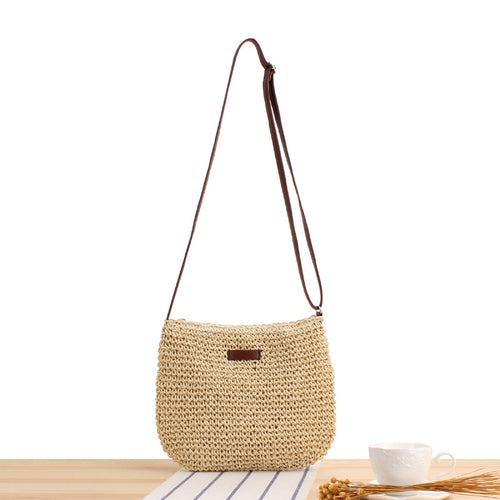 Shoulder bag in woven natural material with detachable leather strap Skanto