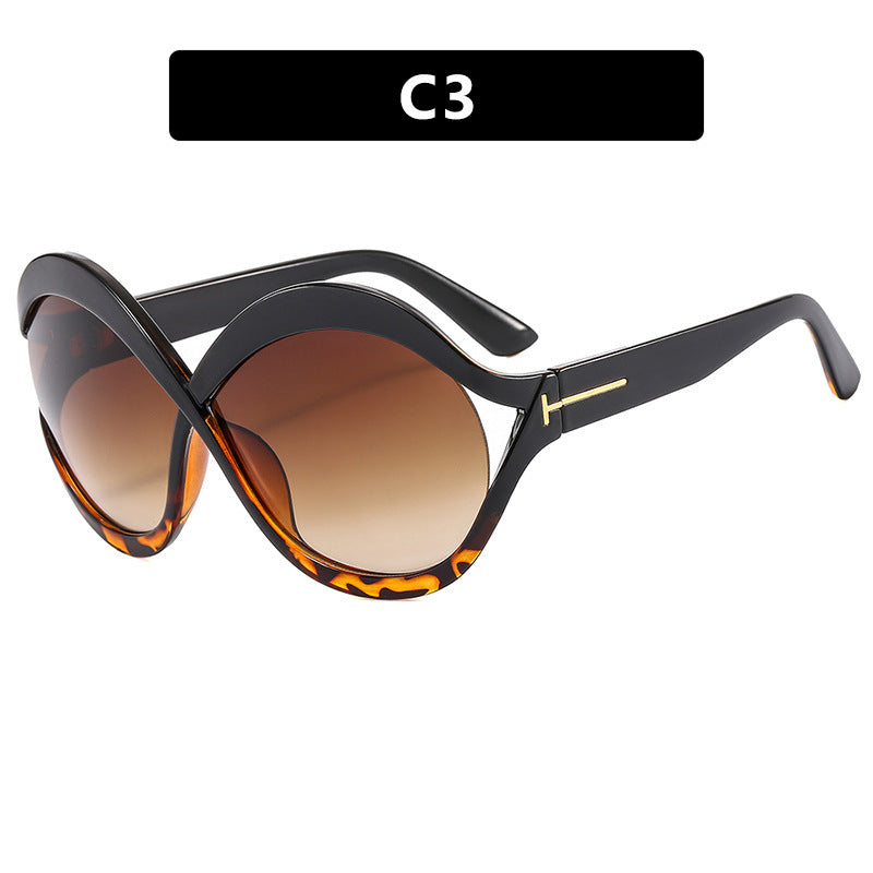 Dame ekstravagant formet solbrille Skanto