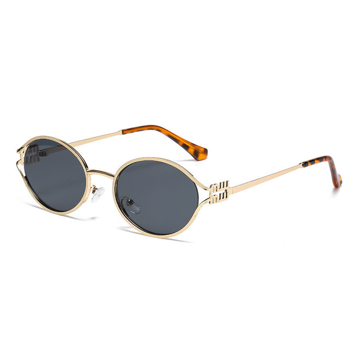 Dame elegant Cat-Eye solbriller med fin metallramme Skanto