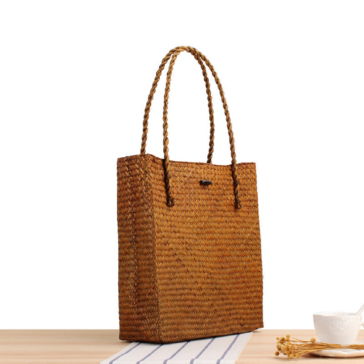 Hand-knotted tote bag in natural weave Skanto