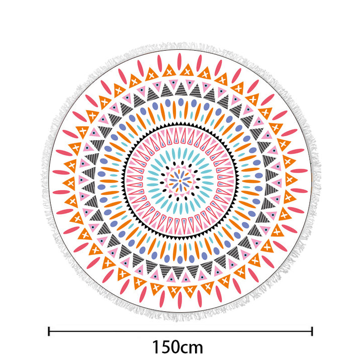 Rundstrandtuch med fargerikt, tropisk blomsterdesign og frynsepynt Skanto