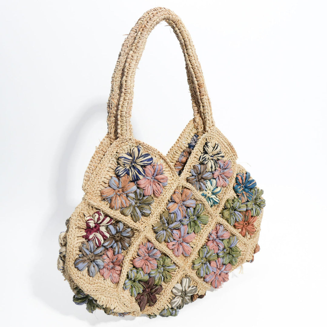 Håndlaget crossover-veske med blomsterbroderier Skanto