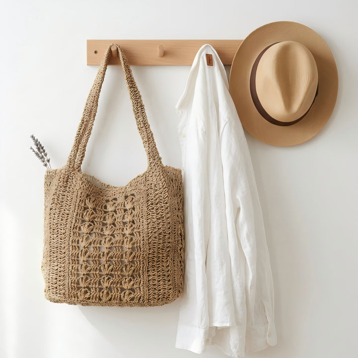 Håndveske i boho-stil laget av flettet naturmateriale Skanto