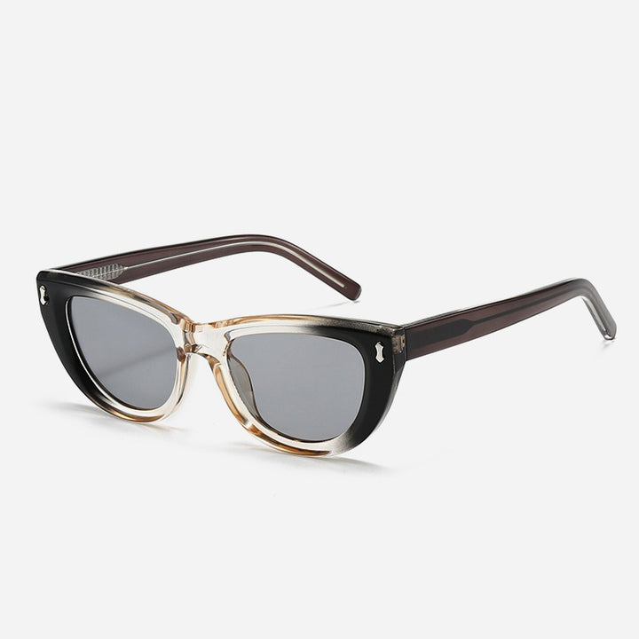 Dame Cat-Eye solbriller med transparent ramme og brune linser Skanto