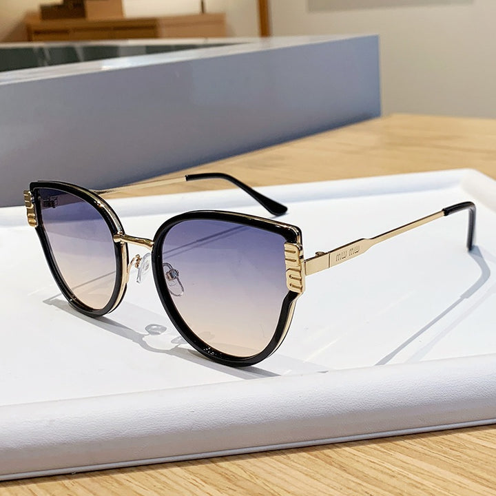 Damer Cat-Eye solbriller med elegante fremhevede linser Skanto