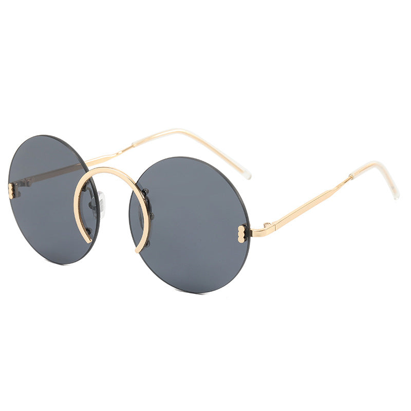 Dame trendy runde solbriller med innovativ metallramme Skanto