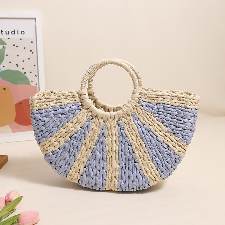 Handbag made of hand-woven raffia with structured base Skanto