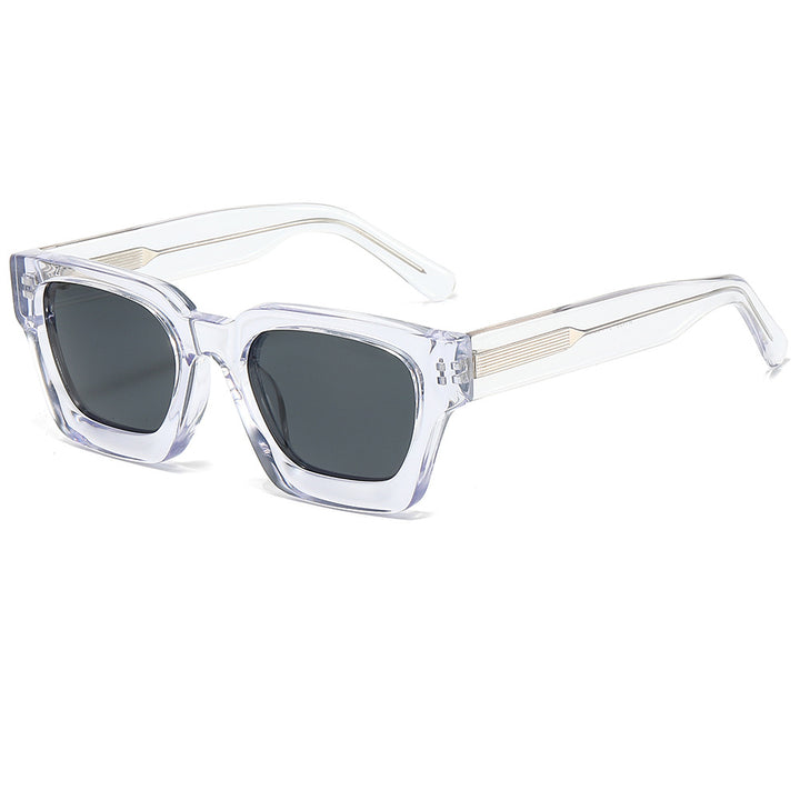Dame designer solbrille med moderne, kvadratisk ramme og UV-beskyttelse Skanto