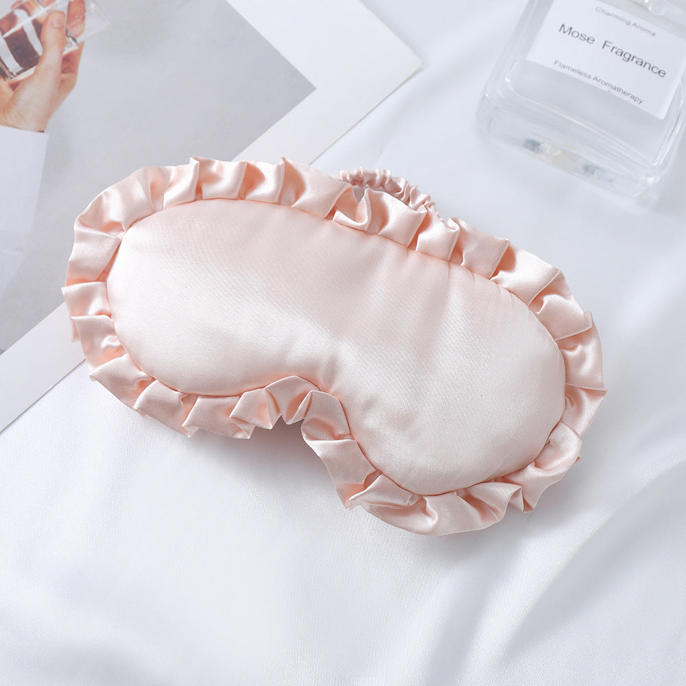 Dame nan satin-glinsende øyemaske med ergonomisk kontur, volangkant og myk polstring Skanto