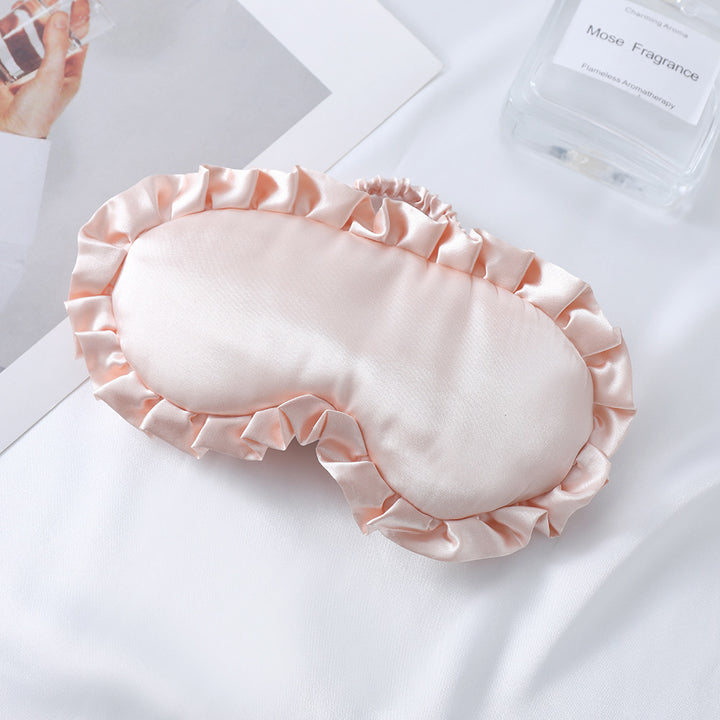 Dame nan satin-glinsende øyemaske med ergonomisk kontur, volangkant og myk polstring Skanto