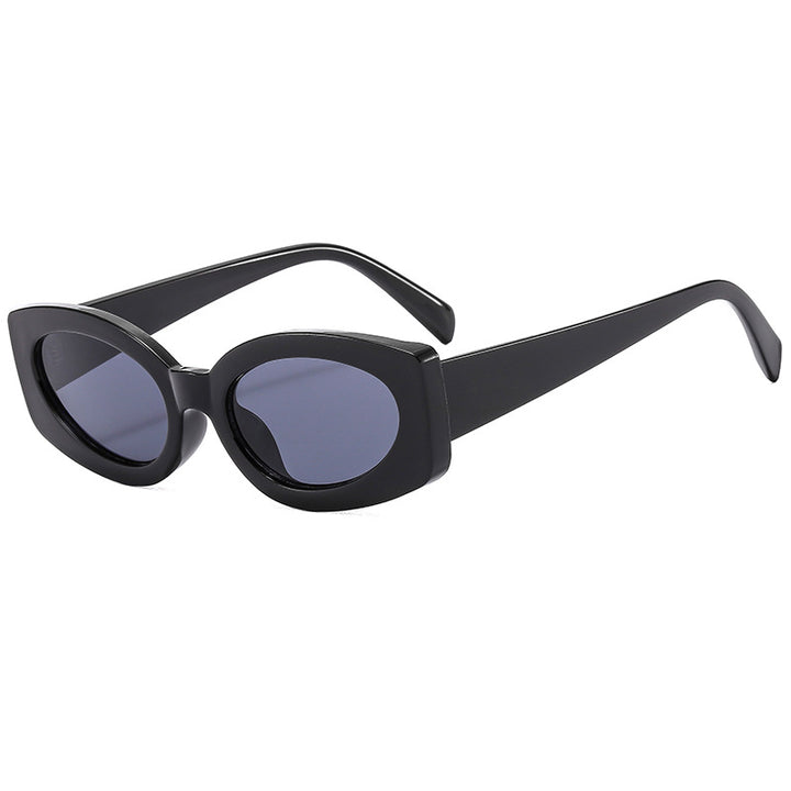 Dame moteriktig solbrille med unikt, bølget ramme Skanto