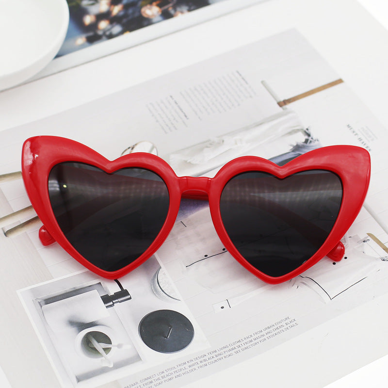 Dame hjerteformet solbrille med glitrende ramme Skanto