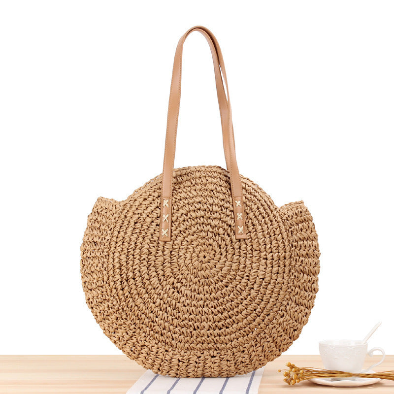Round straw bag with leather handle Skanto