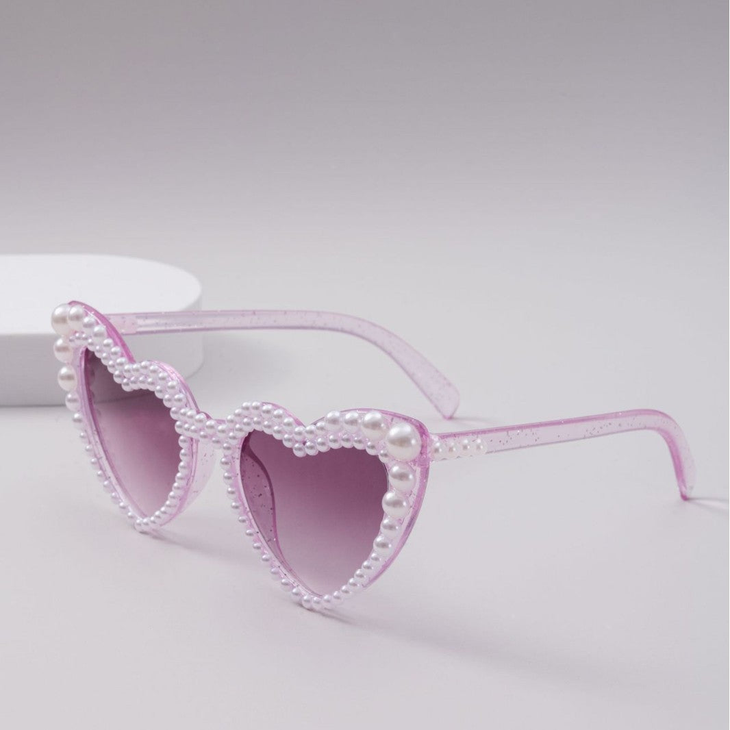 Dame designer solbrille med perleinnramming fra Skanto