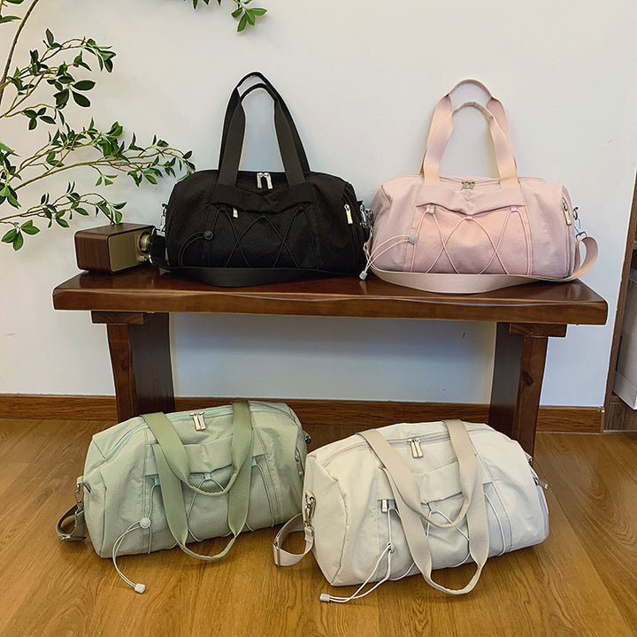 Sporty crossbody bag with adjustable carrying handles and breathable mesh material Skanto