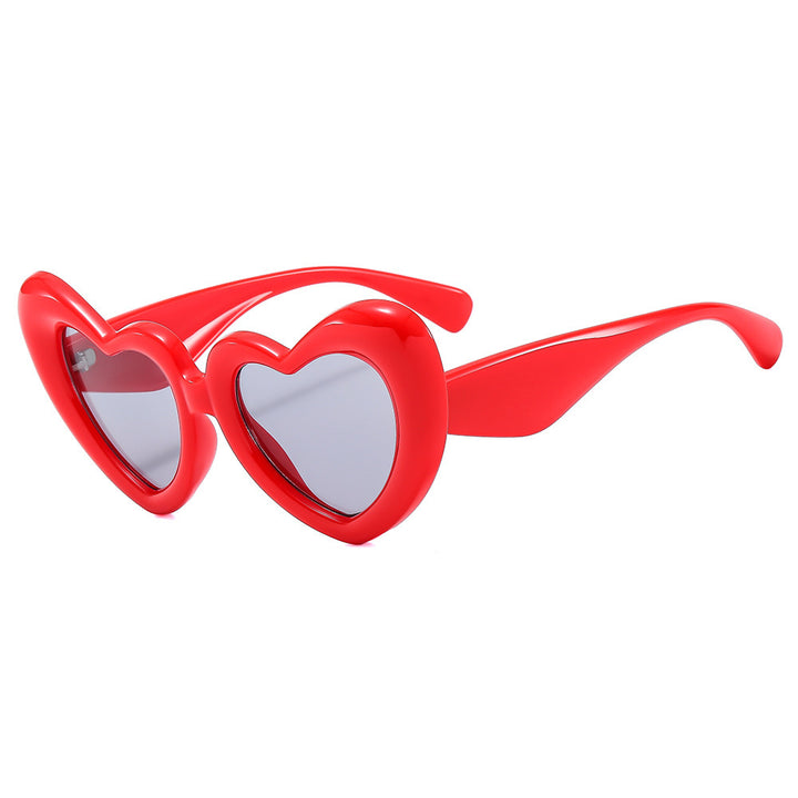 Dame Hjerteformet Solbrille med stilfull innramming Skanto