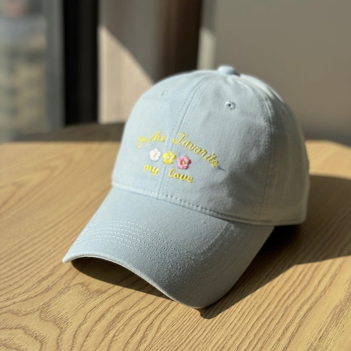 Kvinners broderte tekstlue Skanto