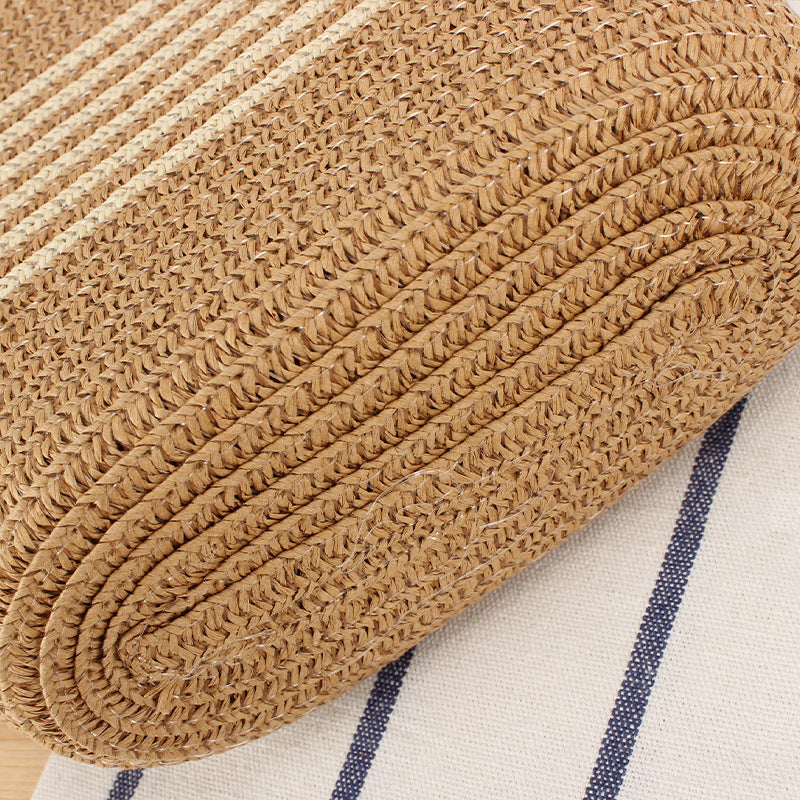 Crossbody bag made of braided natural material with contrasting stripes Skanto