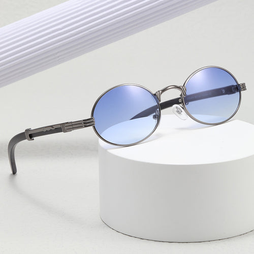 Dame rund designer solbrille med innovativ metallramme Skanto