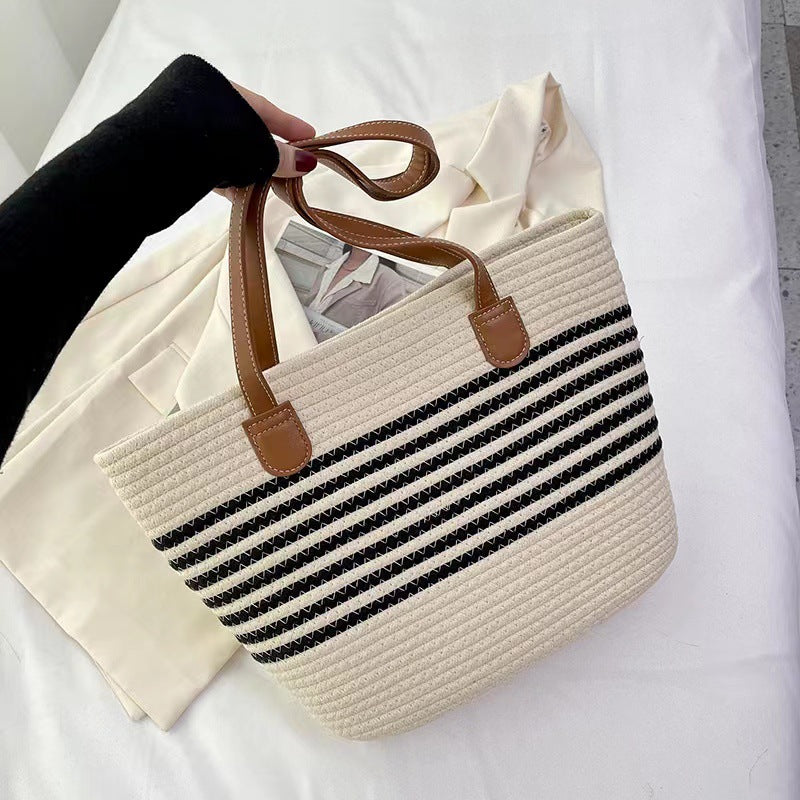 Elegant Tote Bag made of woven raffia with robust leather details Skanto