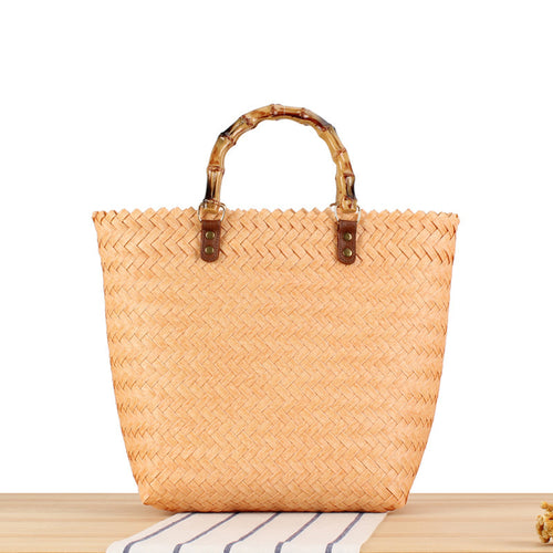 Handbag made of high-quality, braided material with bamboo handle Skanto