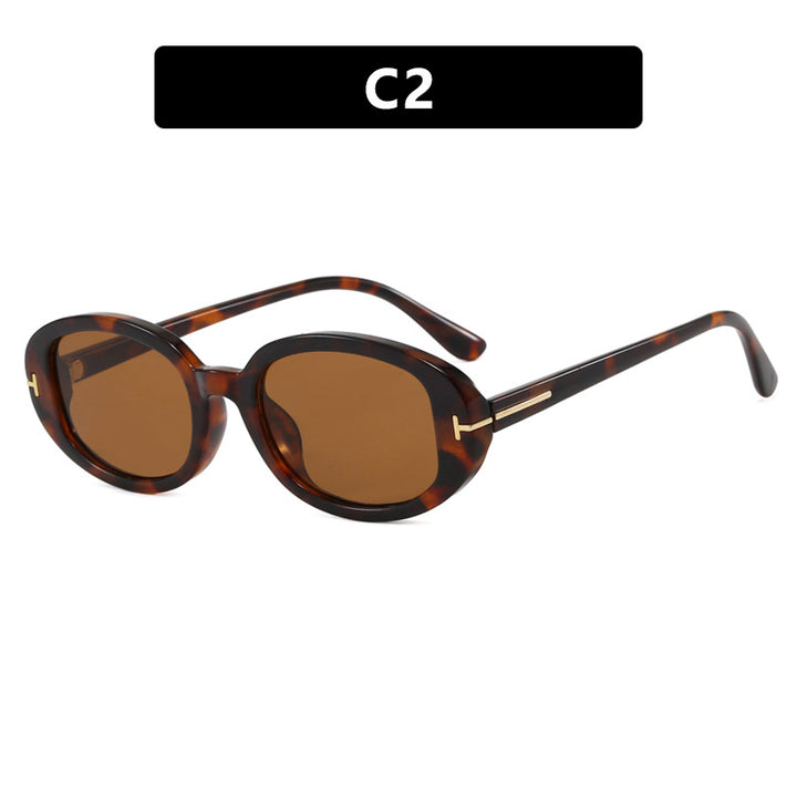 Women's stylish oval sunglasses with golden details Skanto