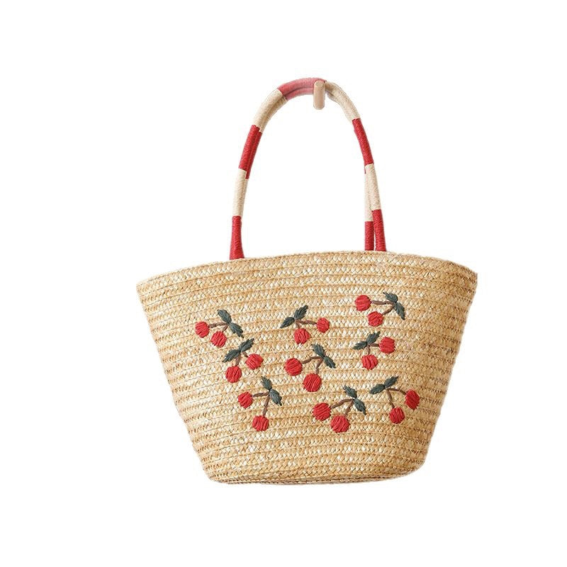 Handmade basket bag with vibrant floral embroidery design Skanto