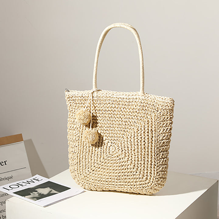 Handmade straw bag with pompom details Skanto