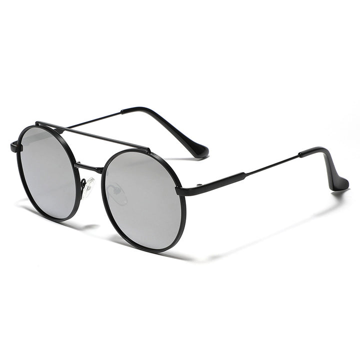 Dame rund solbrille med moteramme Skanto