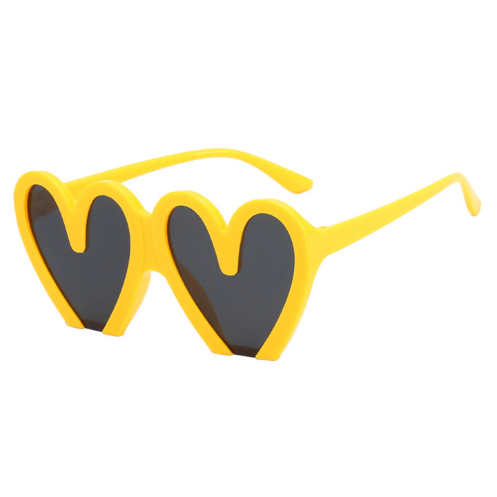 Damer hjerteformet solbrille med robust plastramme og UV-beskyttelse Skanto