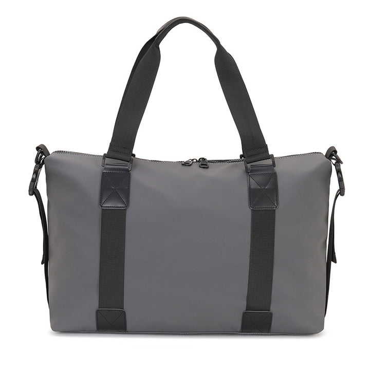 Multifunksjonell sport-duffelbag med vannavvisende materiale og robuste bærehåndtak Skanto