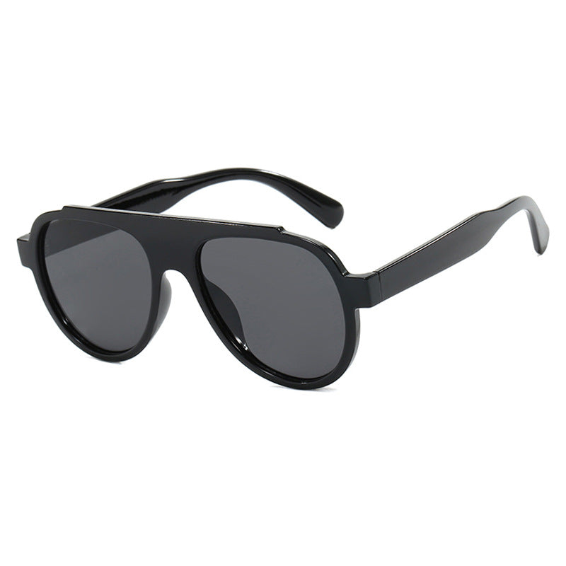 Women's stylish black sunglasses in modern design Skanto