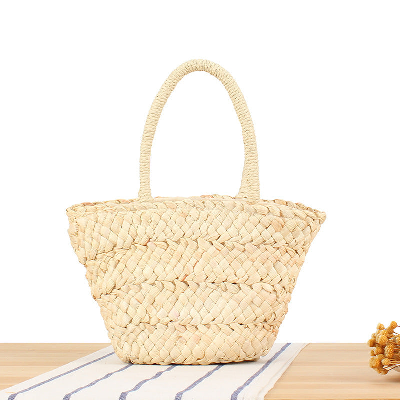 Handbag made of natural woven material Skanto