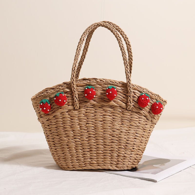 Handmade basket bag with playful strawberry motif Skanto